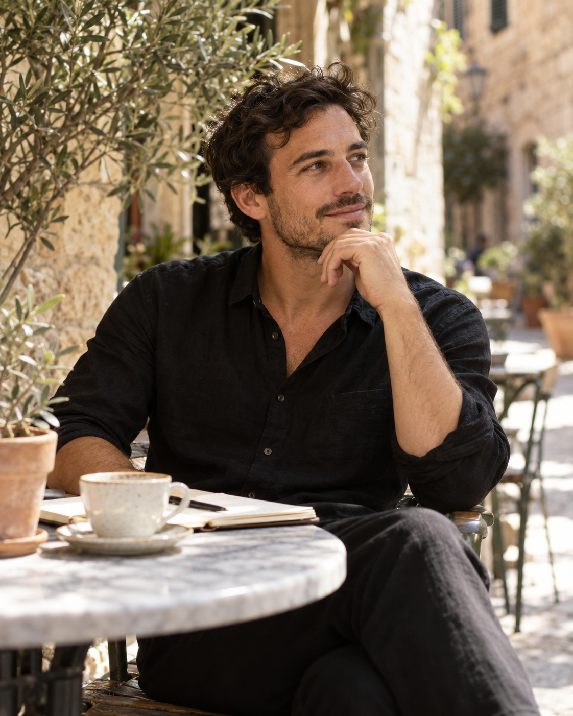 Illustrative lifestyle portrait of a creative professional at a café